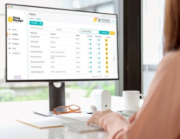 senior care worker looking over a menu on their desktop computer screen